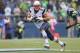 SEATTLE, WA - OCTOBER 14: Tight end Rob Gronkowski #87 of the New England Patriots rushes against the Seattle Seahawks at CenturyLink Field on October 14, 2012 in Seattle, Washington. (Photo by Otto Greule Jr/Getty Images)