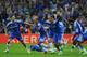 MUNICH, GERMANY - MAY 19: (L-R) Gary Cahill, Florent Malouda, Fernando Torres and Jose Bosingwa of Chelsea celebrate after Didier Drogba scored the winning penalty during UEFA Champions League Final between FC Bayern Muenchen and Chelsea at the Fussball Arena München on May 19, 2012 in Munich, Germany. (Photo by Mike Hewitt/Getty Images)