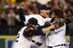 DETROIT, MI - OCTOBER 18: (L-R) Andy Dirks #12, Avisail Garcia #34 and Prince Fielder #28 of the Detroit Tigers celebrate after they won 8-1 against the New York Yankees during game four of the American League Championship Series at Comerica Park on October 18, 2012 in Detroit, Michigan. (Photo by Leon Halip/Getty Images)