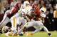 TUSCALOOSA, AL - OCTOBER 22: Trent Richardson #3 of the Alabama Crimson Tide against Prentiss Waggner #23, Marlon Walls #58 and A.J. Johnson #45 of the Tennessee Volunteers at Bryant-Denny Stadium on October 22, 2011 in Tuscaloosa, Alabama. (Photo by Kevin C. Cox/Getty Images)