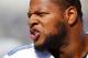 PHILADELPHIA, PA - OCTOBER 14: Ndamukong Suh #90 of the Detroit Lions looks on from the sidelines before the start of their game against the Philadelphia Eagles at Lincoln Financial Field on October 14, 2012 in Philadelphia, Pennsylvania. The Lions defeated the Eagles 26-23. (Photo by Rich Schultz /Getty Images)