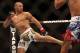 September 22, 2012; Toronto, ON, CANADA; Cub Swanson kicks at Charles Oliveira in the featherweights fight during UFC 152 at the Air Canada Centre. Mandatory Credit: Tom Szczerbowski-US PRESSWIRE