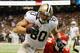 NEW ORLEANS, LA - SEPTEMBER 23: Jimmy Graham #80 of the New Orleans Saints scores a touchdown over Brandon Flowers #24 of the Kansas City Chiefs at the Mercedes-Benz Superdome on September 23, 2012 in New Orleans, Louisiana. (Photo by Chris Graythen/Getty Images)