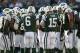 EAST RUTHERFORD, NJ - OCTOBER 14: Mark Sanchez #6 and Tim Tebow #15 of the New York Jets talk to the huddle against the Indianapolis Colts at MetLife Stadium on October 14, 2012 in East Rutherford, New Jersey. (Photo by Nick Laham/Getty Images)