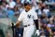NEW YORK, NY - OCTOBER 14: Alex Rodriguez #13 of the New York Yankees reacts as he walks back to the dugout after he struck out in the bottom of the second inning against the Detroit Tigers during Game Two of the American League Championship Series at Yankee Stadium on October 14, 2012 in the Bronx borough of New York City. (Photo by Elsa/Getty Images)