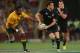 BRISBANE, AUSTRALIA - OCTOBER 20: Daniel Carter of the All Blacks passes during the Bledisloe Cup match between the Australian Wallabies and the New Zealand All Blacks at Suncorp Stadium on October 20, 2012 in Brisbane, Australia. (Photo by Chris Hyde/Getty Images)