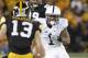 IOWA CITY, IOWA - OCTOBER 20: Tailback Bill Belton #1of the Penn State Nittany Lions rushes up field during the second quarter in front of safety Tom Donatell #13 of the Iowa Hawkeyes on October 20, 2012 at Kinnick Stadium in Iowa City, Iowa. Iowa lead Penn State 24-0 at the half. (Photo by Matthew Holst/Getty Images)