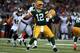 ST LOUIS, MO - OCTOBER 21: Quarterback Aaron Rodgers #12 of the Green Bay Packers looks for a receiver against the St. Louis Rams at Edward Jones Dome on October 21, 2012 in St Louis, Missouri. The Packers defeated the Rams 30-20. (Photo by Doug Pensinger/Getty Images)