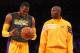 LOS ANGELES, CA - OCTOBER 21: Dwight Howard #12 (L) and Kobe Bryant #24 of the Los Angeles Lakers talks as they warm up to play the Sacramento Kings at Staples Center on October 21, 2012 in Los Angeles, California. NOTE TO USER: User expressly acknowledges and agrees that, by downloading and or using this photograph, User is consenting to the terms and conditions of the Getty Images License Agreement. (Photo by Stephen Dunn/Getty Images)
