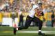 GREEN BAY, WI - SEPTEMBER 30: Tight end Jimmy Graham #80 of the New Orleans Saints runs after a reception against the Green Bay Packers at Lambeau Field on September 30, 2012 in Green Bay, Wisconsin. (Photo by Jeff Gross/Getty Images)