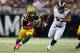 Oct 21, 2012; St. Louis, MO, USA; Green Bay Packers running back Alex Green (20) carries the ball while under pressure from St. Louis Rams defensive tackle Kendall Langford (98) at Edward Jones Dome. The Packers defeated the Rams 30-20. Mandatory Credit: Scott Kane-US PRESSWIRE