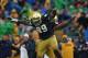 SOUTH BEND, IN - OCTOBER 13: Kapron Lewis-Moore #89 and Matthias Farley #41 of the Notre Dame Fighting Irish celebrate a blocking field goal against the Standford Cardinal at Notre Dame Stadium on October 13, 2012 in South Bend, Indiana. (Photo by Jonathan Daniel/Getty Images)