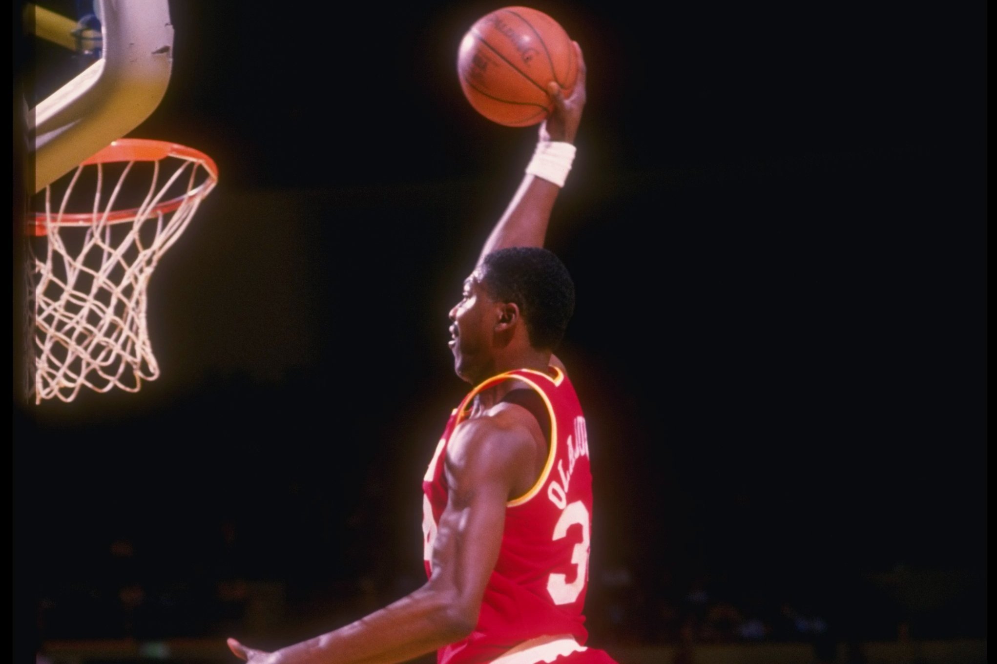 New York Knicks' Patrick Ewing does a reverse slam dunk during