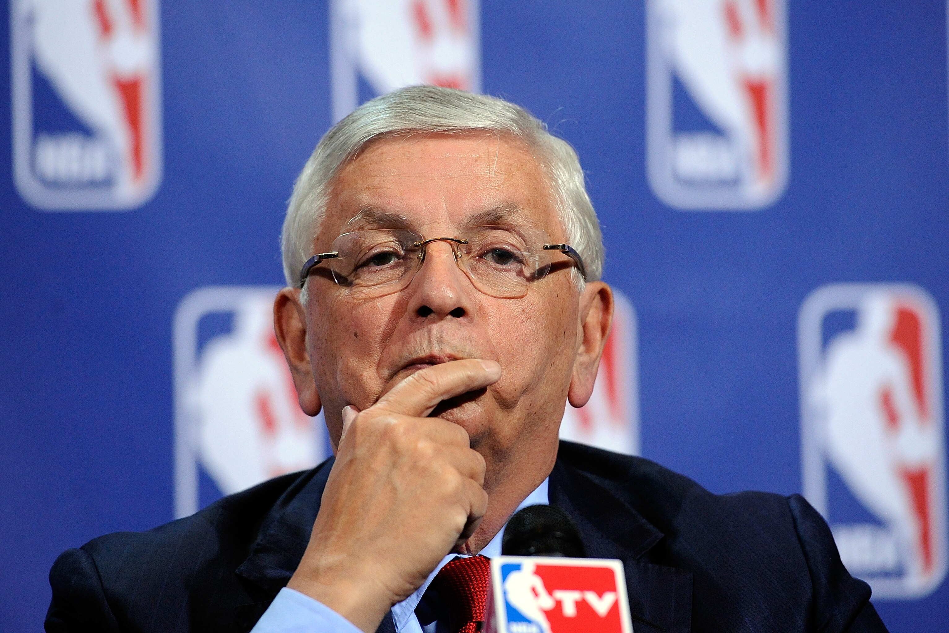 FILE - NBA Commissioner David Stern, left, poses after a WNBA