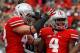 COLUMBUS, OH - OCTOBER 20: Nathan Williams #43 congratulates C.J. Barnett #4, both of the Ohio State Buckeyes, after intercepting a pass in the end zone during the second quarter against the Purdue Boilermakers on October 20, 2012 at Ohio Stadium in Columbus, Ohio. (Photo by Kirk Irwin/Getty Images)