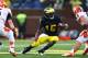 Denard Robinson is pinball-like when weaving through defenses.