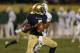CHICAGO, IL - OCTOBER 06: Everett Golson #5 of the Notre Dame Fighting Irish looks for a receiver against the Miami Hurricanes at Soldier Field on October 6, 2012 in Chicago, Illinois. Notre Dame defeated Miami 41-3. (Photo by Jonathan Daniel/Getty Images)