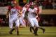 LINCOLN, NE - SEPTEMBER 29: Running back Montee Ball #28 of the Wisconsin Badgers is escorted by teammate tight end Jacob Pedersen #48 through the Nebraska Cornhuskers at Memorial Stadium on September 29, 2012 in Lincoln, Nebraska. Nebraska won 30-27. (Photo by Eric Francis/Getty Images)