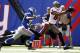 EAST RUTHERFORD, NJ - SEPTEMBER 16: Vincent Jackson #83 of the Tampa Bay Buccaneers makes a catch and runs in for a touchdown in front of Michael Coe #37 of the New York Giants during a game at MetLife Stadium on September 16, 2012 in East Rutherford, New Jersey. (Photo by Jeff Zelevansky/Getty Images)