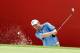 KUALA LUMPUR, MALAYSIA - OCTOBER 26: Robert Garrigus of USA plays out of the bunker on the 18th hole during day two of the CIMB Classic at The MINES Resort & Golf Club on October 26, 2012 in Kuala Lumpur, Malaysia. (Photo by Stanley Chou/Getty Images)