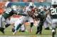 MIAMI GARDENS, FL - SEPTEMBER 23: Daniel Thomas #33 of the Miami Dolphins runs with the ball against the New York Jets on September 23, 2012 at Sun Life Stadium in Miami Gardens, Florida. The Jets defeated the Dolphins 23-20 in overtime. (Photo by Joel Auerbach/Getty Images)
