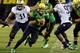 EUGENE, OR - OCTOBER 6: Quarterback Marcus Mariota #8 of the Oregon Ducks scrambles out of the pocket during the first quarter of the game against the Washington Huskies on October 6, 2012 at Autzen Stadium in Eugene, Oregon. Oregon won the game 52-21. (Photo by Steve Dykes/Getty Images)