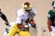 September 15, 2012; East Lansing, MI, USA; Notre Dame Fighting Irish running back George Atkinson III (4) runs the ball as Michigan State Spartan defenders pursue during the first half at Spartan Stadium. Mandatory Credit: Mike Carter-US PRESSWIRE