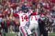 Oct 27, 2012; Little Rock, AR, USA; Ole Miss Rebels quarterback Bo Wallace (14) passes the ball during the first half of a game against the Arkansas Razorbacks at War Memorial Stadium. Ole Miss defeated Arkansas 30-27. Mandatory Credit: Beth Hall-US PRESSWIRE