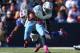 ORCHARD PARK, NY - OCTOBER 21: Chris Johnson #28 of the Tennessee Titans tries to break a tacle during an NFL game by Nigel Bradham #53 of the Buffalo Bills at Ralph Wilson Stadium on October 21, 2012 in Orchard Park, New York. (Photo by Tom Szczerbowski/Getty Images)