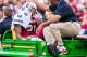 October 27, 2012; Columbia, SC, USA; South Carolina Gamecocks running back Marcus Lattimore (21) is carted off the field after being injured against the Tennessee Volunteers in the first half at Williams-Brice Stadium. Mandatory Credit: Jeff Blake-US PRESSWIRE