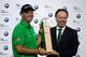 SHANGHAI, CHINA - OCTOBER 28: Peter Hanson (L) of Sweden is presented with the winners trophy by Dr. Ian Robertson, Member of the Board of Manangement of BMW AG, after the final round of the BMW Masters at the Lake Malaren Golf Club on October 28, 2012 in Shanghai, China. (Photo by Scott Halleran/Getty Images)