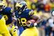 October 20, 2012; Ann Arbor, MI, USA; Michigan Wolverines running back Fitzgerald Toussaint (28) runs the bases in the first quarter against the Michigan State Spartans at Michigan Stadium. Mandatory Credit: Rick Osentoski-US PRESSWIRE