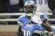 DETROIT, MI - NOVEMBER 20: Nate Burleson #13 scores on a 16 yard pass from Matthew Stafford #9 and celebrates with teammate Titus Young #16 during the game against the Carolina Panthers at Ford Field on November 20, 2011 in Detroit, Michigan. The Lions defeated the Panthers 49-35. (Photo by Leon Halip/Getty Images)