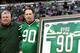Oct 28, 2012; East Rutherford, NJ, USA; New York Jets former players Dennis Byrd (right) and Scott Mesereau during half time ceremonies at the game against the Miami Dolphins at MetLife Stadium. Dolphins won 30-9. Mandatory Credit: Debby Wong-US PRESSWIRE