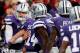 MANHATTAN, KS - OCTOBER 27: Quarterback Collin Klein #7 of the Kansas State Wildcats is congratulated by teammates after running the ball in for a touchdown during the game against the Texas Tech Red Raiders at Bill Snyder Family Football Stadium on October 27, 2012 in Manhattan, Kansas. (Photo by Jamie Squire/Getty Images)