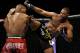 Apr 21, 2012; Atlanta, GA, USA; Jon Jones fights (red trunks) fights Rashad Evans in the main event and light heavyweight title bout during UFC 145 at Philips Arena. Mandatory Credit: Paul Abell-US PRESSWIRE