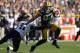 GREEN BAY, WI - SEPTEMBER 30: Wide receiver Jordy Nelson #87 of the Green Bay Packers is pursued by strong safety Roman Harper #41 of the New Orleans Saints at Lambeau Field on September 30, 2012 in Green Bay, Wisconsin. (Photo by Jeff Gross/Getty Images)