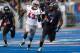 BOISE, ID - OCTOBER 20: D.J. Harper #7 of the Boise State Broncos runs the ball against Tim Hasson #43 of the UNLV Rebels at Bronco Stadium on October 20, 2012 in Boise, Idaho. (Photo by Otto Kitsinger III/Getty Images)