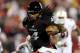LOUISVILLE, KY - OCTOBER 26: Munchie Legaux #4 of the Cincinnati Bearcats runs for a touchdown during the game against the Louisville Cardinals at Papa John's Cardinal Stadium on October 26, 2012 in Louisville, Kentucky. (Photo by Andy Lyons/Getty Images)