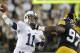 IOWA CITY, IOWA - OCTOBER 20: Quarterback Matt McGloin #11 of the Penn State Nittany Lions drops back for a pass during the first quarter in front of defensive lineman Darian Cooper #97 of the Iowa Hawkeyes on October 20, 2012 at Kinnick Stadium in Iowa City, Iowa. Penn State defeated Iowa 38-14. (Photo by Matthew Holst/Getty Images)