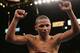LAS VEGAS - NOVEMBER 27: Ivan Calderon celebrates after defeating Carlos Fajardo for the WBO World Mini-Flyweight Championship at the MGM Grand Garden Arena on November 27, 2004 in Las Vegas, Nevada. Calderon defeated Fajardo in a unanimous decision after 12 rounds. (Photo by Al Bello/Getty Images)