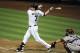 SAN DIEGO, CA - SEPTEMBER 7: Chase Headley #7 of the San Diego Padres hits a solo home run during the eighth inning of a baseball game against the Arizona Diamondbacks at Petco Park on September 7, 2012 in San Diego, California. The Padres won 6-5. (Photo by Denis Poroy/Getty Images)
