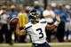 DETROIT, MI - OCTOBER 28: Russell Wilson #3 of the Seattle Seahwaks drops back to pass during the fourth quarter of the game against the Detroit Lions at Ford Field on October 28, 2012 in Detroit, Michigan. The Lions defeated the Seahwaks 28-24. (Photo by Leon Halip/Getty Images)