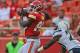 KANSAS CITY, MO - SEPTEMBER 30: Wide receiver Dwayne Bowe #82 of the Kansas City Chiefs catches a 29-yard touchdown pass against defensive back Antoine Cason #20 of the San Diego Chargers during the fourth quarter on September 30, 2012 at Arrowhead Stadium in Kansas City, Missouri. San Diego defeated Kansas City 37-20. (Photo by Peter Aiken/Getty Images)