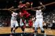 ATLANTA, GA - OCTOBER 07: LeBron James #6 of the Miami Heat drives against Ivan Johnson #44 and Johan Petro #10 of the Atlanta Hawks at Philips Arena on October 7, 2012 in Atlanta, Georgia. NOTE TO USER: User expressly acknowledges and agrees that, by downloading and or using this photograph, User is consenting to the terms and conditions of the Getty Images License Agreement. (Photo by Kevin C. Cox/Getty Images)