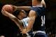 Oct 27, 2012; Durham, NC, USA; Western Washington Vikings guard Richard Woodworth (14) defends as Duke Blue Devils guard Quinn Cook (2) drives to the basket during the first half at Cameron Indoor Stadium. Mandatory Credit: Mark Dolejs-US PRESSWIRE