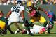 GREEN BAY, WI - OCTOBER 28: Alex Green #20 of the Green Bay Packers looks to avoid a tackle against the Jacksonville Jaguars at Lambeau Field on October 28, 2012 in Green Bay, Wisconsin. (Photo by Dilip Vishwanat/Getty Images)