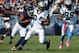 Oct 28, 2012; Chicago, IL, USA; Carolina Panthers running back DeAngelo Williams (34) rushes the ball against the Chicago Bears during the second half at Soldier Field. The Chicago Bears defeat the Carolina Panthers 23-22. Mandatory Credit: Mike DiNovo-US PRESSWIRE