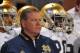Oct. 27, 2012; Norman, OK, USA; Notre Dame Fighting Irish head coach Brian Kelly waits to take the field before the game against the Oklahoma Sooners at Oklahoma Memorial Stadium. Notre Dame won 30-13. Mandatory Credit: Matt Cashore-US PRESSWIRE