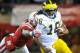 Full speed. Quarter-speed. Doesn't matter. Denard Robinson's presence is capable of changing a game.